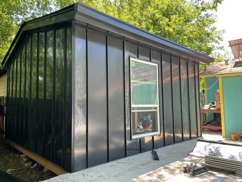 Black standing seam metal wall panels for Metal Roof Installation in Yankton