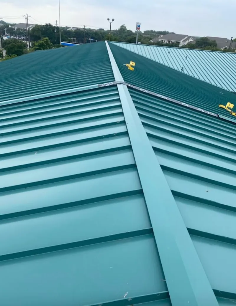 Green commercial metal roof ridge and valley for Metal Roof Repair in Yankton