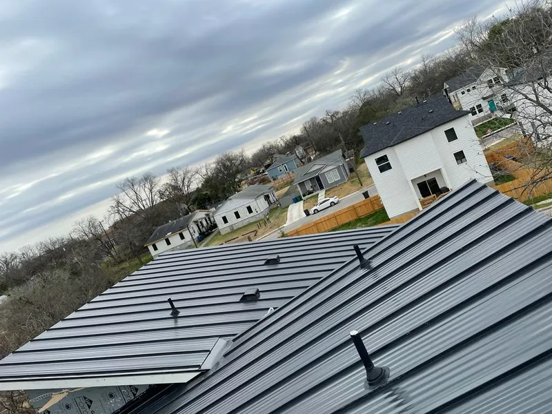 Standing seam metal roof panels with vents for Skylight Repair in Yankton